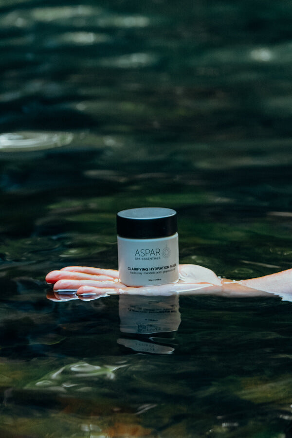 Jar of Aspar product floating on water